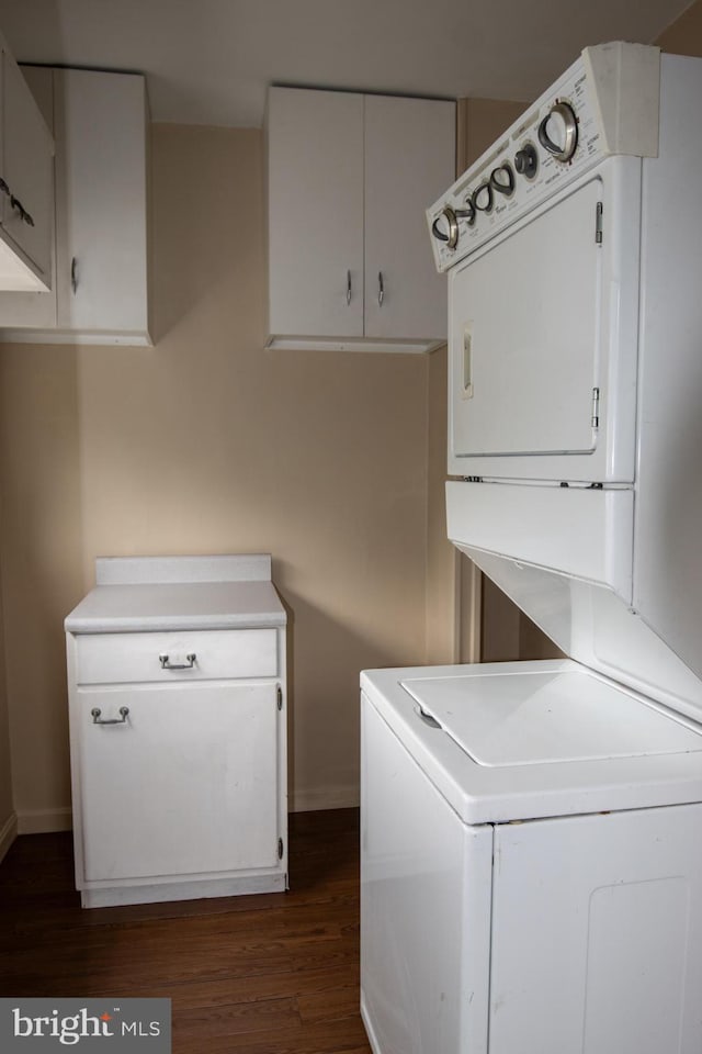 laundry area featuring dark hardwood / wood-style flooring