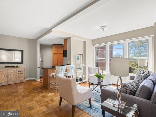 living room featuring light parquet flooring