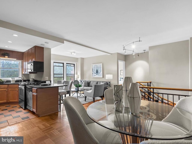 dining room with dark parquet floors