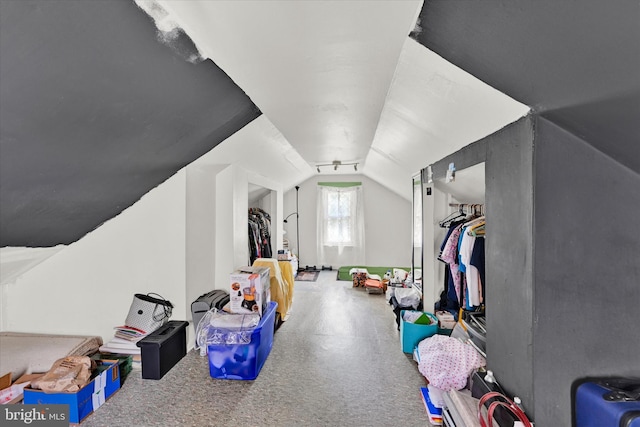 game room with vaulted ceiling