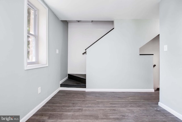 stairs with hardwood / wood-style flooring