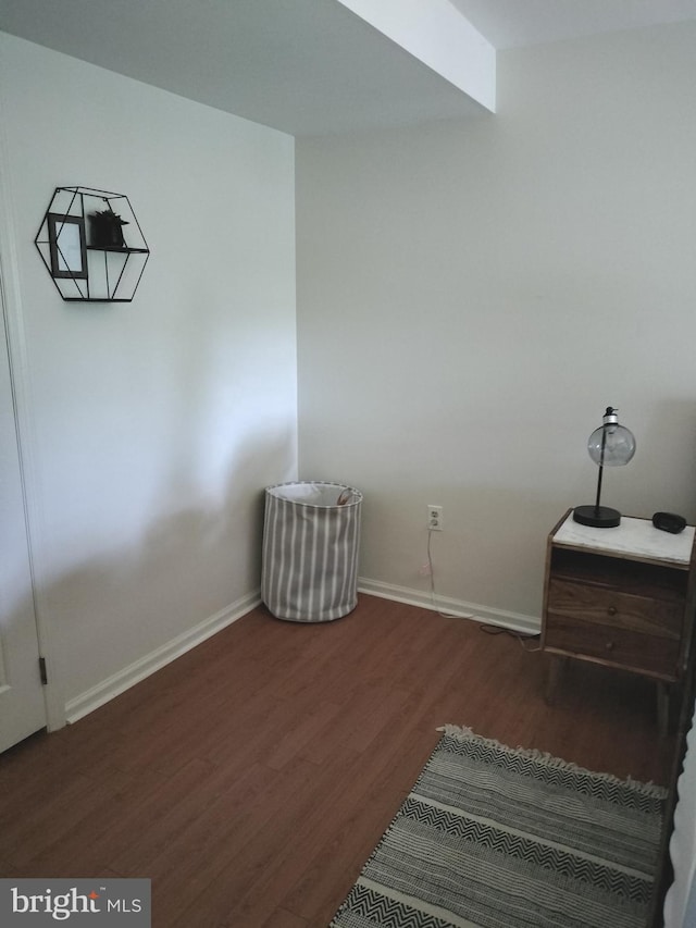 interior space with dark hardwood / wood-style floors