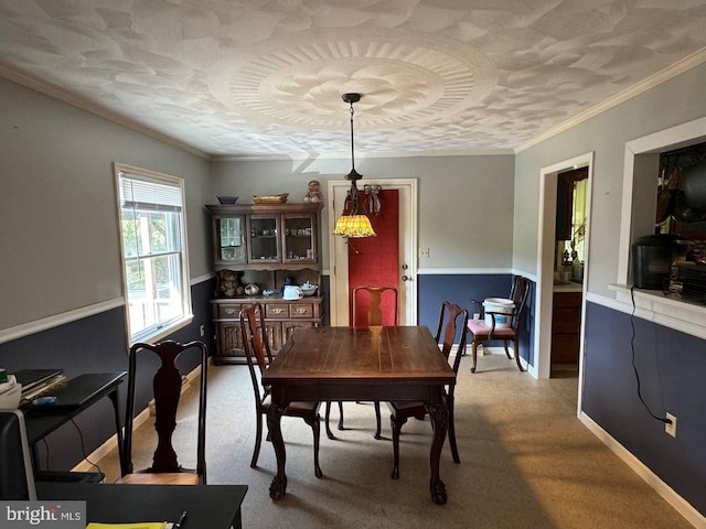 dining area featuring ornamental molding