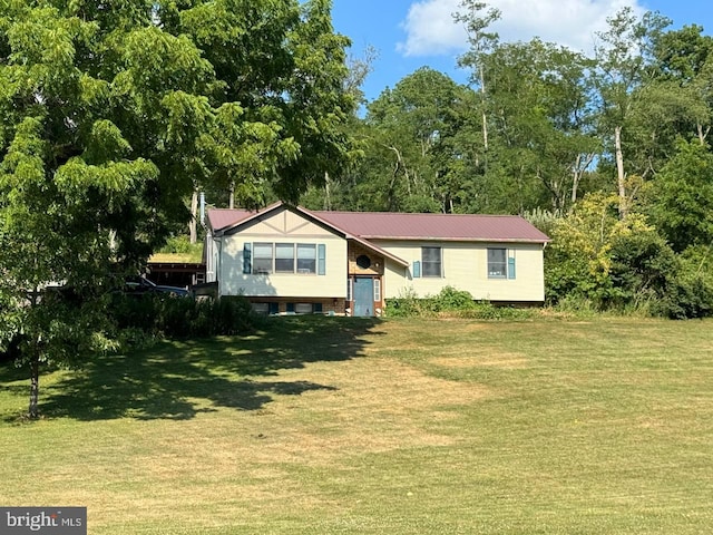 view of front of home with a front yard