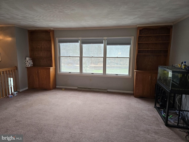 unfurnished living room featuring a textured ceiling, carpet flooring, and ornamental molding