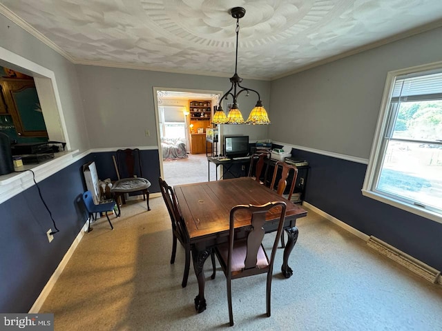 dining area with crown molding