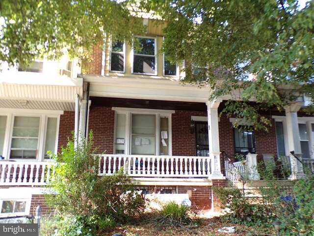 view of front of home featuring covered porch