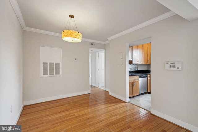 kitchen featuring dishwasher, light wood-type flooring, ornamental molding, and decorative light fixtures