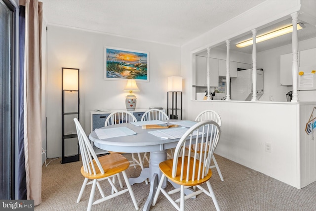 view of carpeted dining room