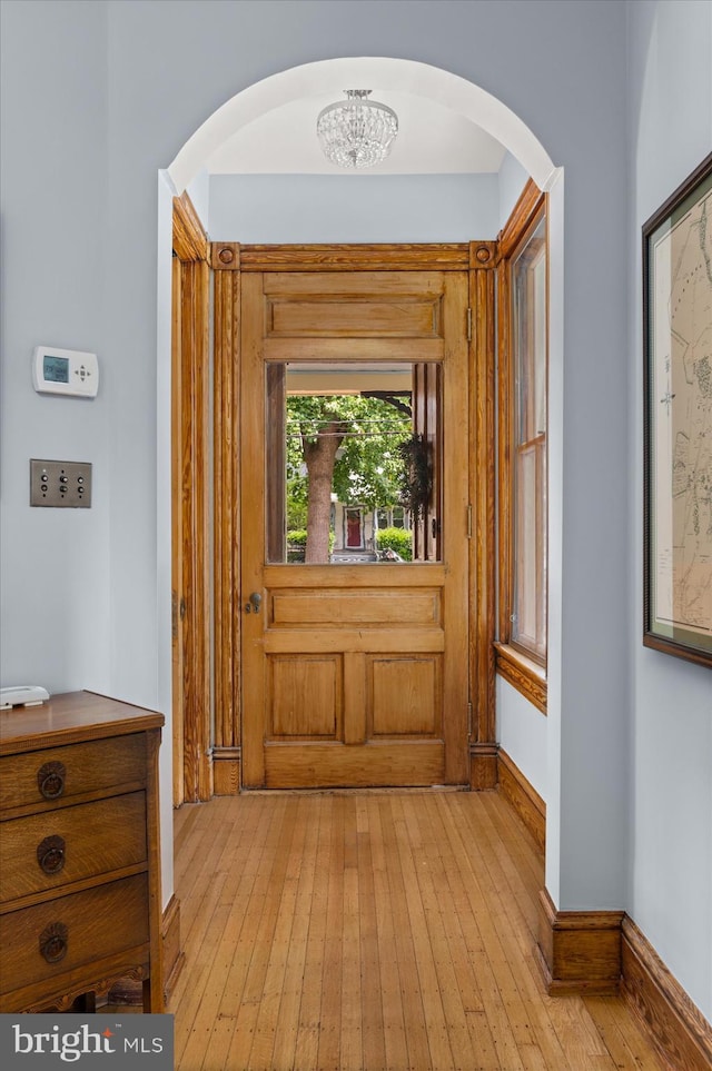 entryway with light hardwood / wood-style floors