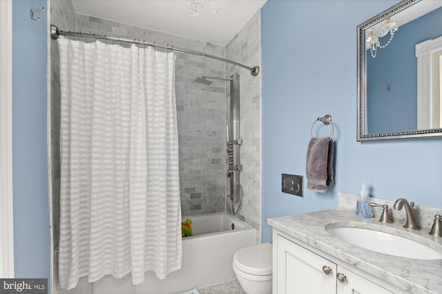 full bathroom featuring vanity, toilet, and shower / bath combination with curtain