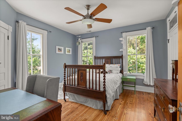 bedroom featuring ceiling fan and light wood-type flooring