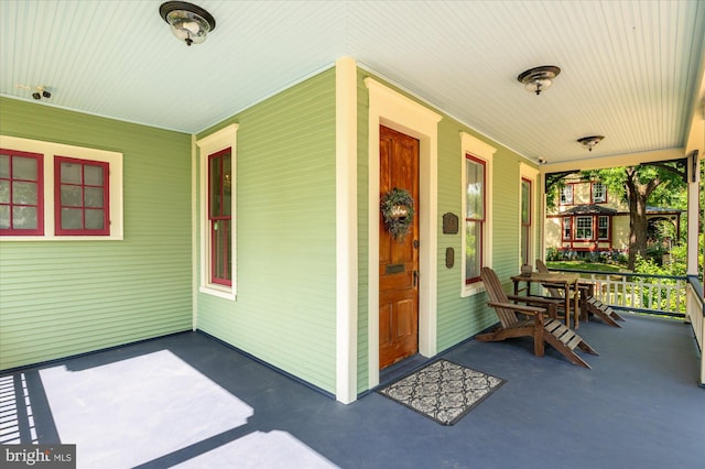 entrance to property with covered porch