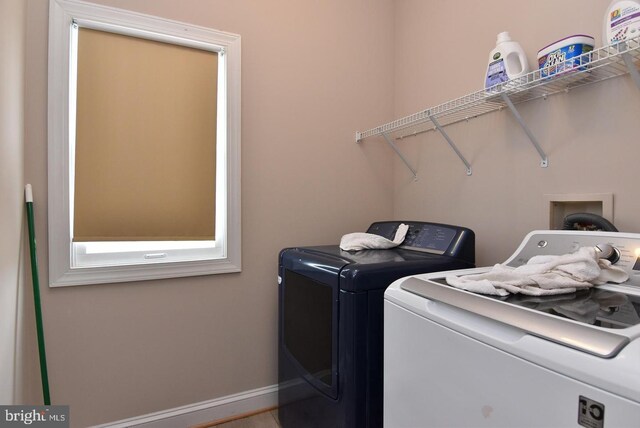 washroom with washer and clothes dryer