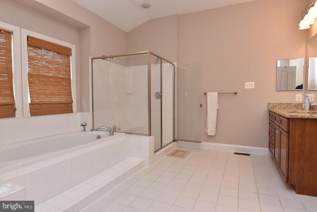 bathroom featuring vanity, plus walk in shower, tile patterned flooring, and lofted ceiling