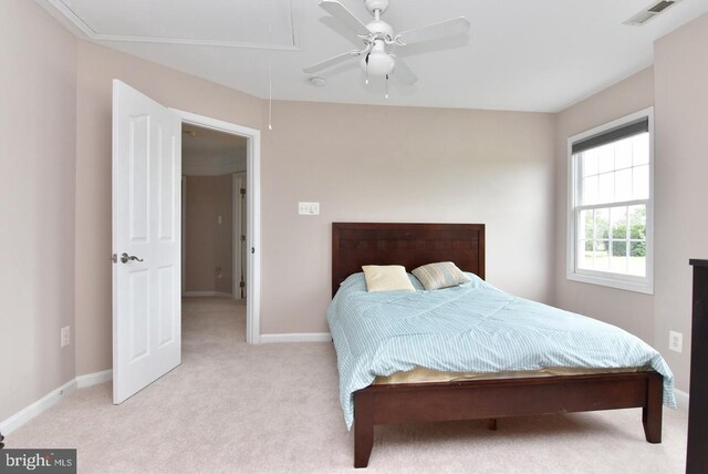 carpeted bedroom with ceiling fan