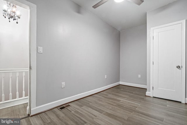 bonus room featuring ceiling fan and light hardwood / wood-style flooring