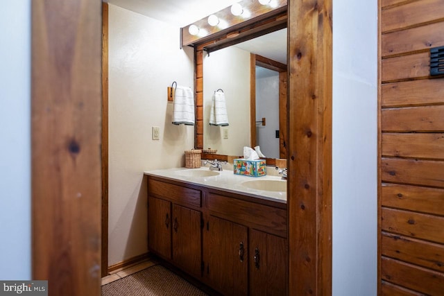 bathroom with vanity and tile patterned flooring