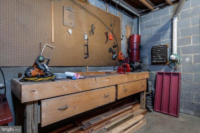 basement with a workshop area