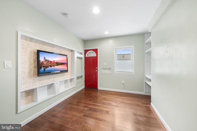 foyer entrance featuring wood-type flooring