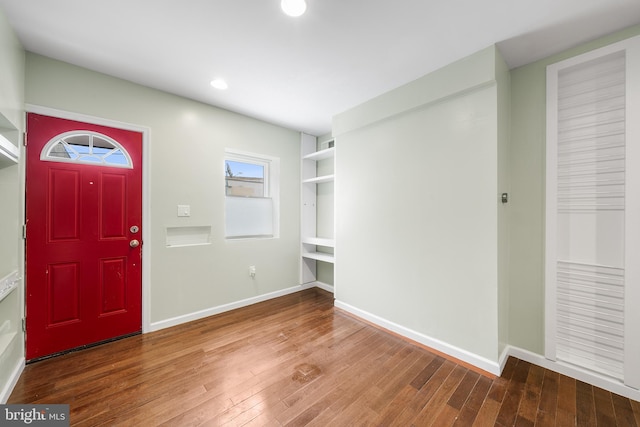 entrance foyer featuring hardwood / wood-style floors