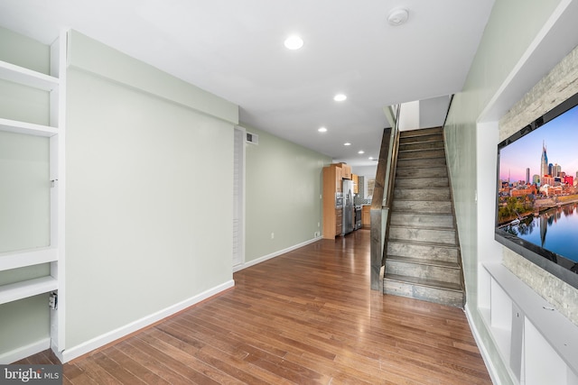 hallway featuring hardwood / wood-style floors