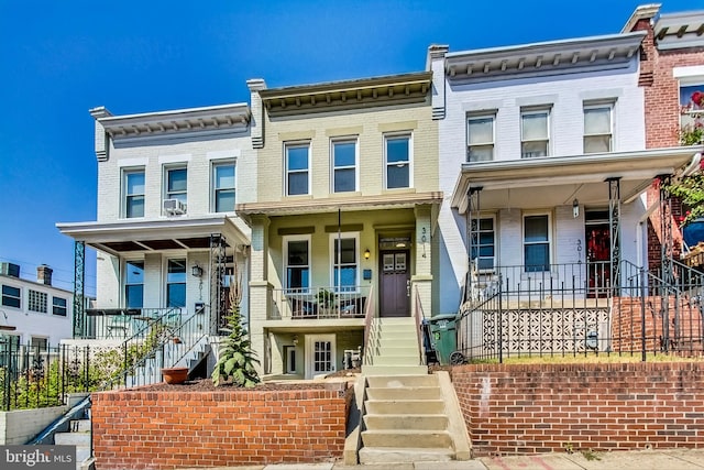 multi unit property featuring covered porch