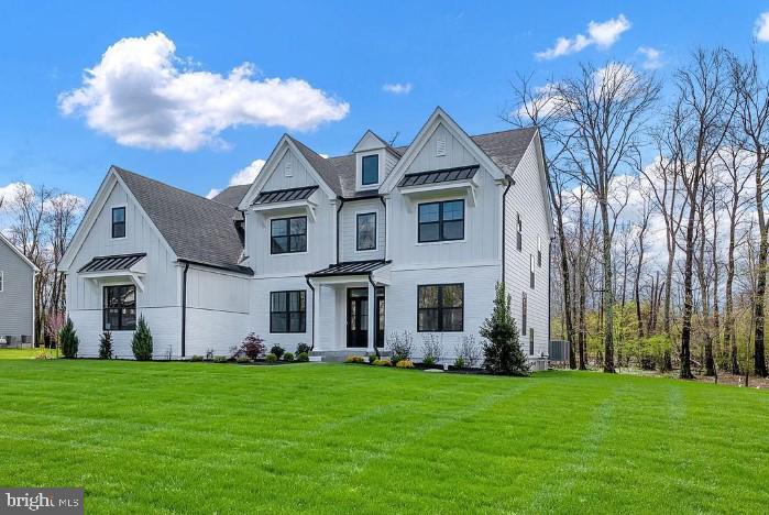 view of front of home with a front lawn