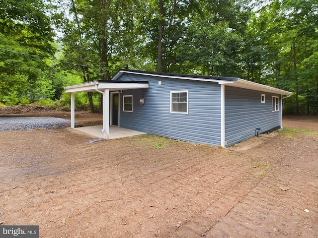 view of front of property featuring a patio area