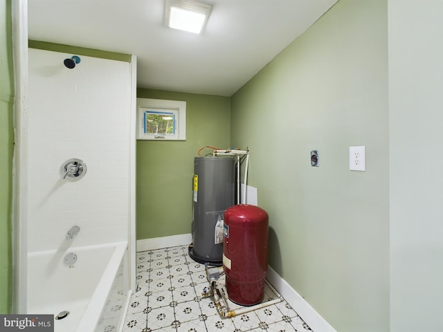 bathroom featuring shower / washtub combination and electric water heater