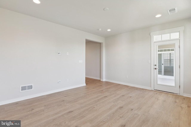 empty room featuring light hardwood / wood-style floors