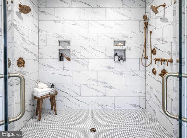 bathroom featuring an enclosed shower