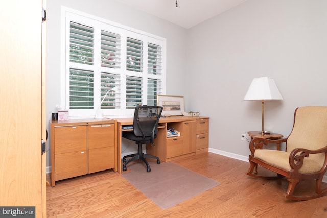 home office featuring light hardwood / wood-style flooring