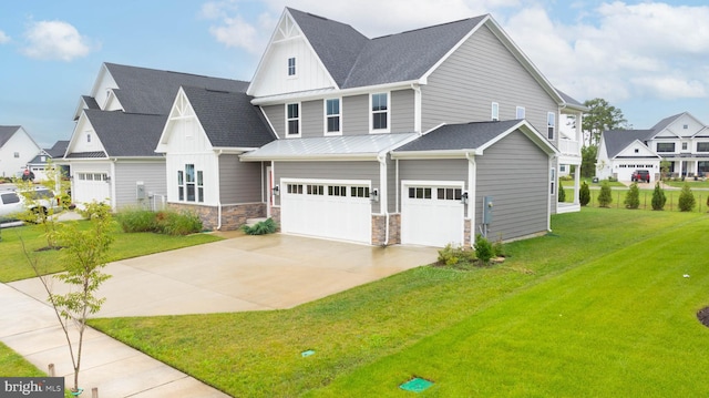 view of front facade featuring a garage and a front lawn