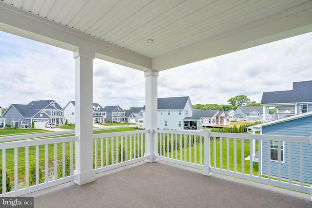 balcony featuring a porch