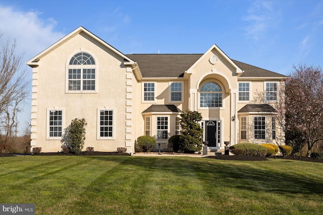 view of front of home with a front yard