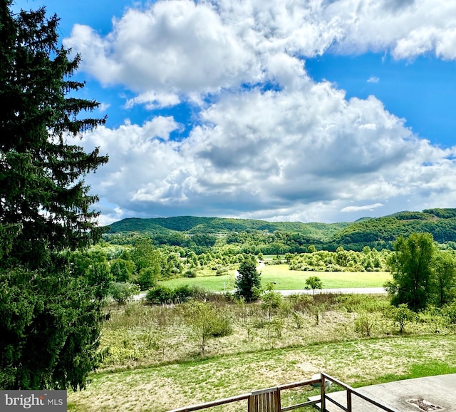 view of mountain feature featuring a rural view