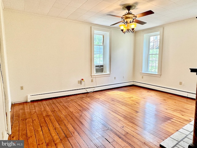 unfurnished room with ceiling fan and wood-type flooring