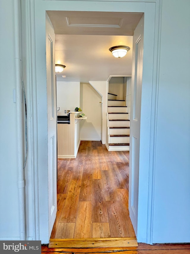 hall featuring hardwood / wood-style floors