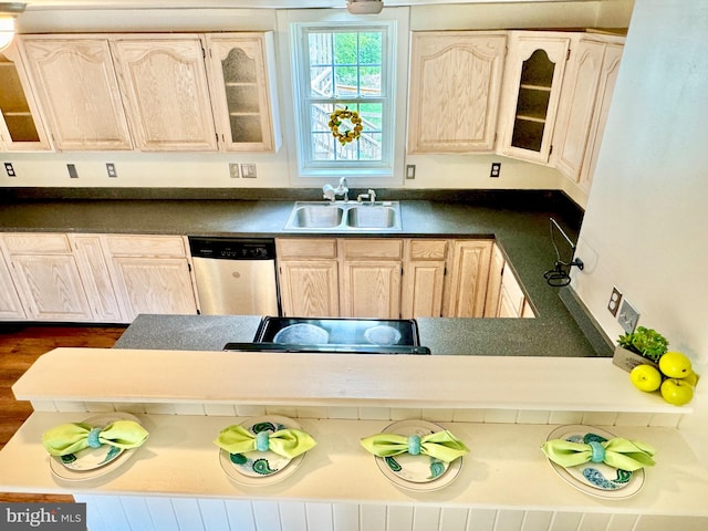 kitchen with dishwasher, dark wood-type flooring, sink, and light brown cabinets