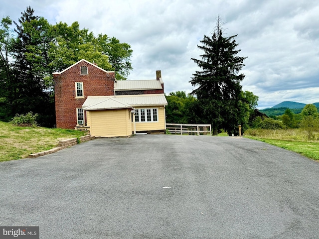 view of front facade with a mountain view