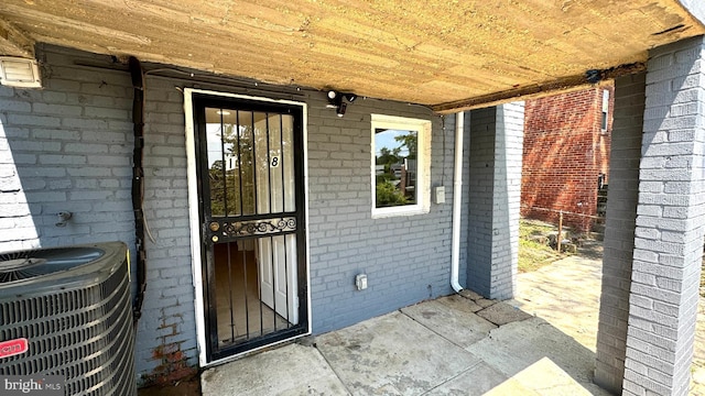 property entrance with cooling unit