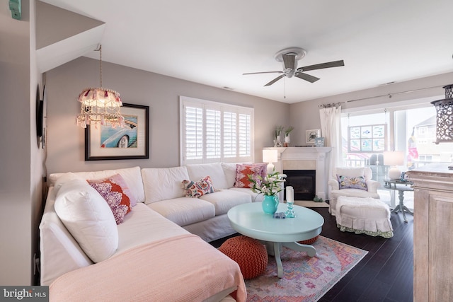 living room with ceiling fan and hardwood / wood-style floors