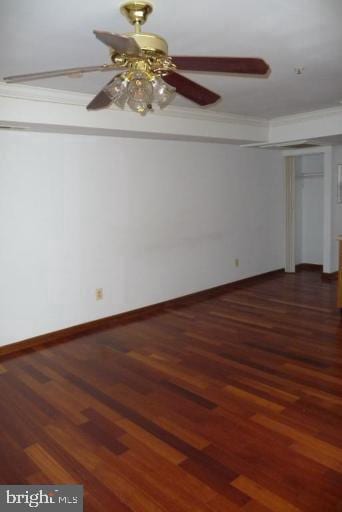 spare room with ornamental molding, hardwood / wood-style flooring, and ceiling fan