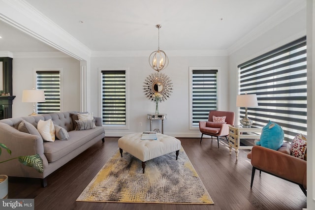 living room with ornamental molding, a wealth of natural light, and dark hardwood / wood-style floors