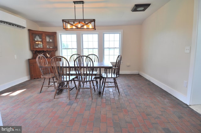 dining space with an AC wall unit