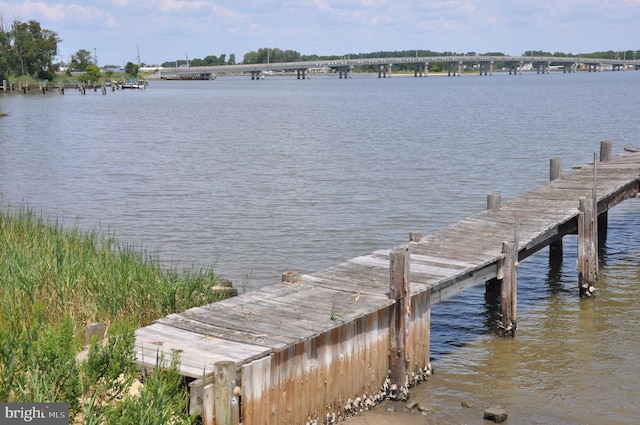 view of dock with a water view