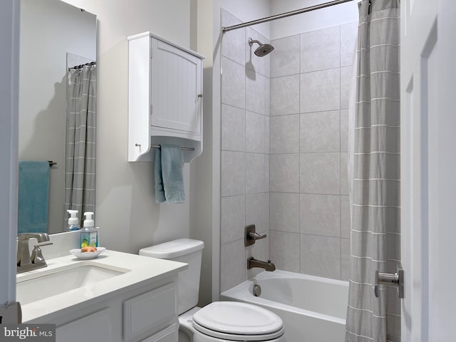 full bathroom with vanity, toilet, and shower / bath combo