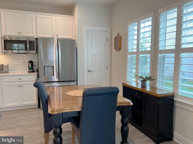 dining area featuring light hardwood / wood-style floors