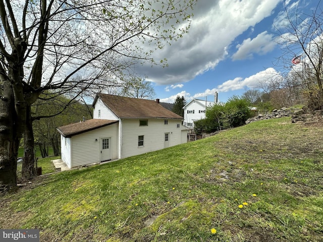 exterior space featuring a lawn